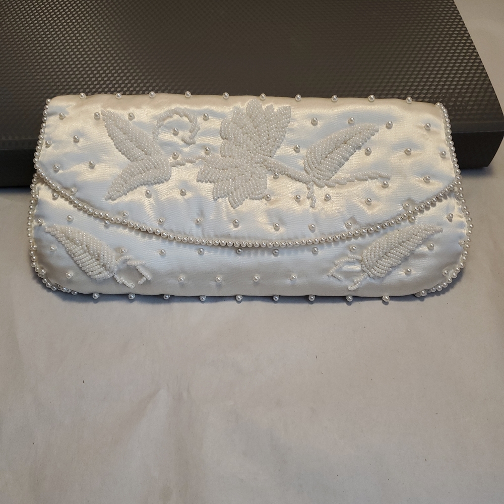 Vintage envelope cream satin beaded purse. BAG BY DORMAR